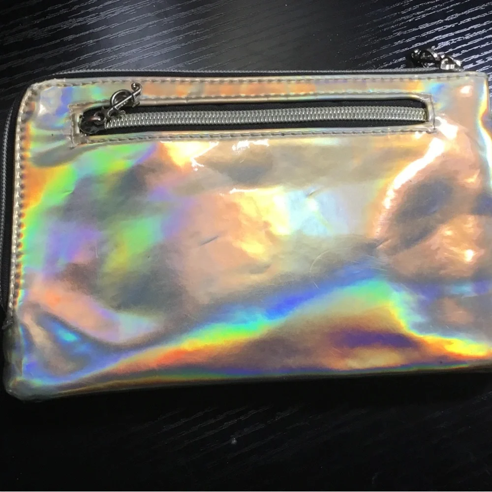 (126) Juicy Couture 7’ Charging Case Iridescent Holographic Wristlet